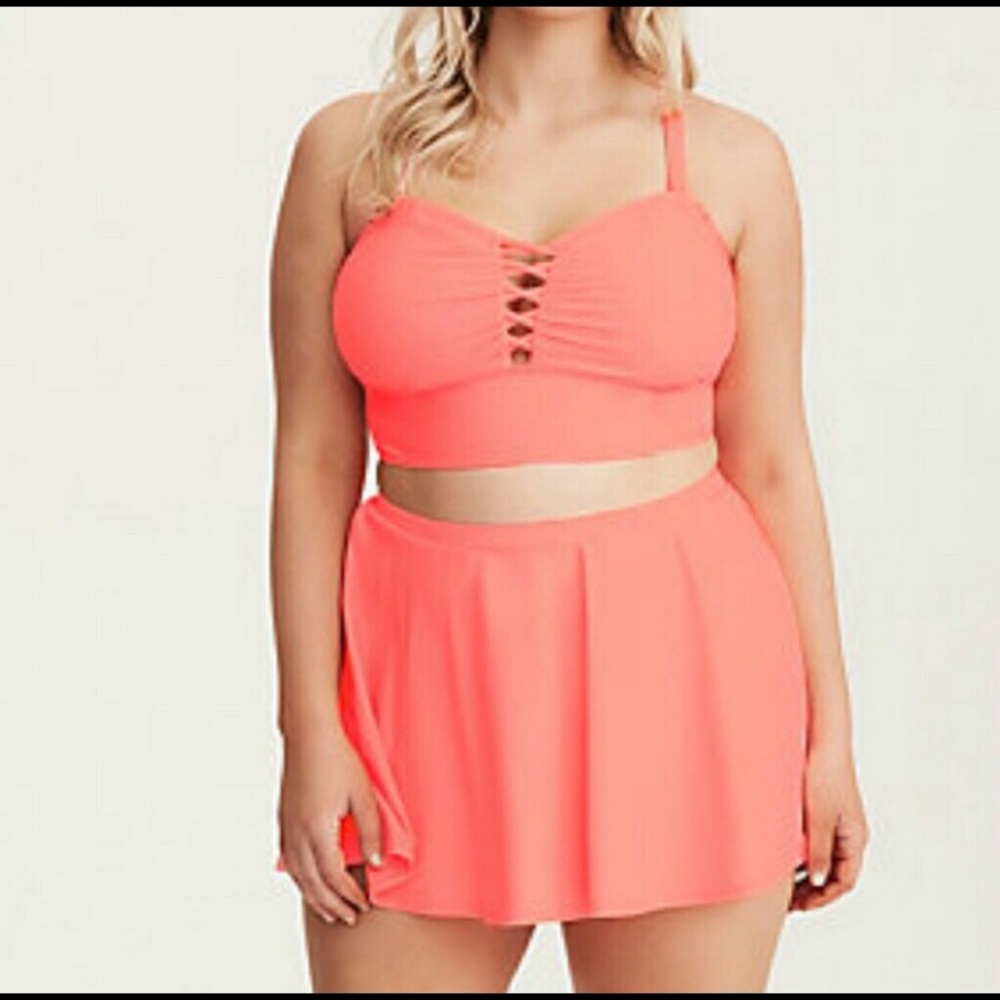 Peach colored swim suit by Torrid